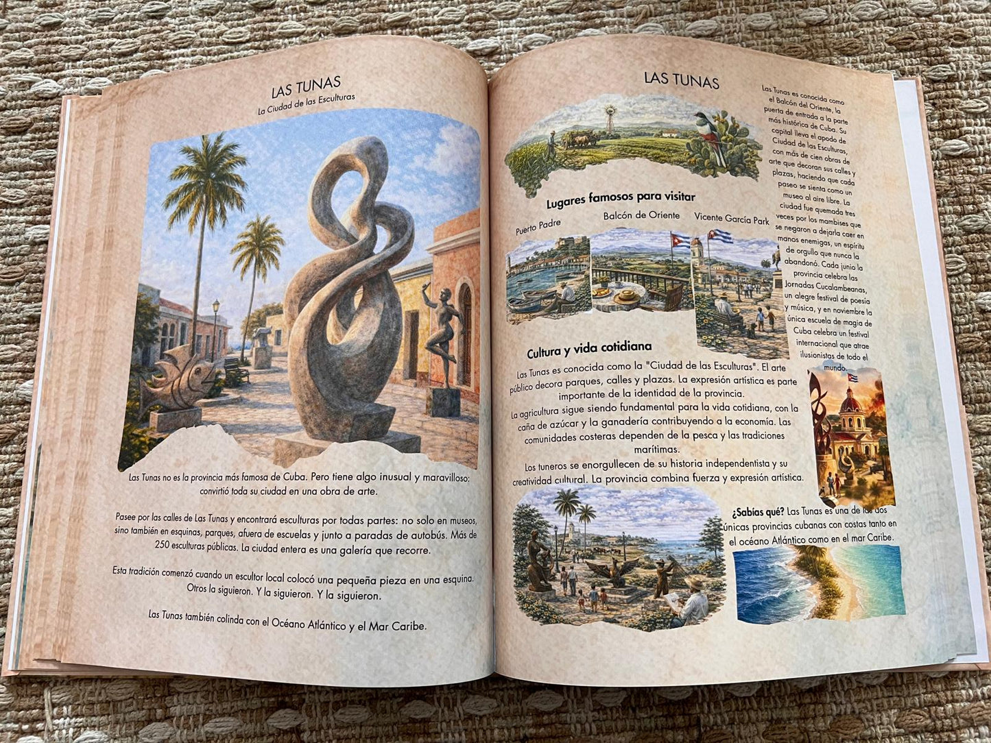 Open book with illustrations of landscapes and architecture on a textured surface of Micuba.co of Cuba